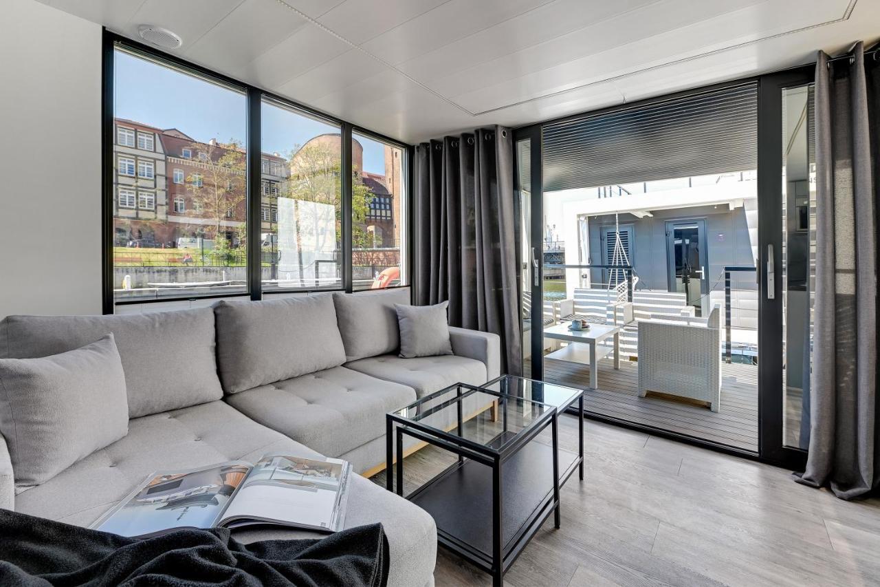 Domy Na Wodzie - La Mare Motlava Houseboats With Sauna By Downtown Apartments 格但斯克 外观 照片