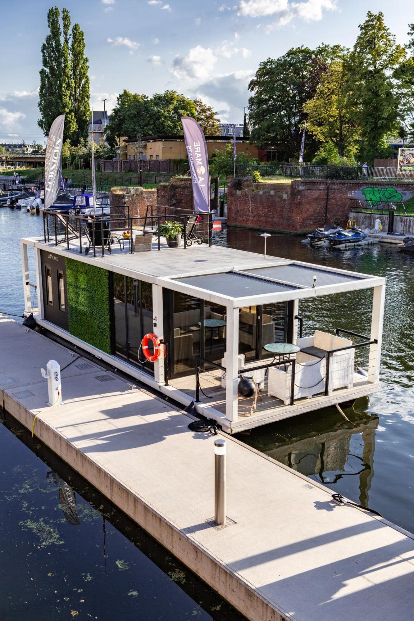 Domy Na Wodzie - La Mare Motlava Houseboats With Sauna By Downtown Apartments 格但斯克 外观 照片